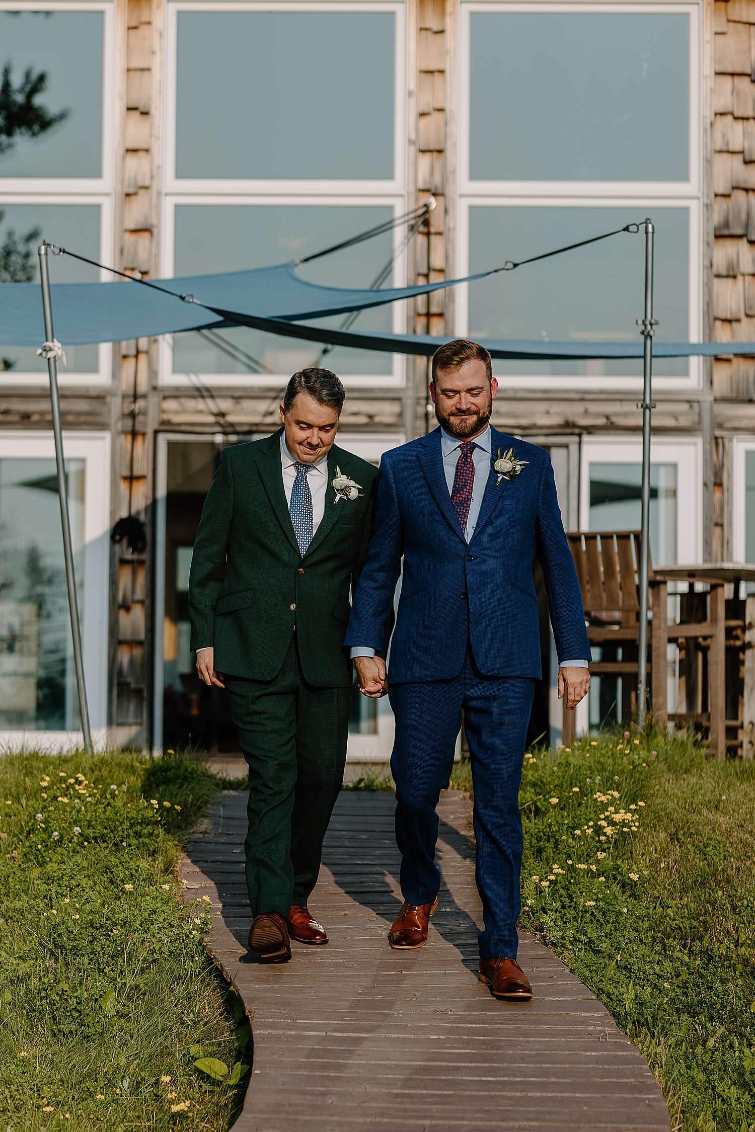 two men walk down pathway for intimate ceremony by Samantha Burke Photography