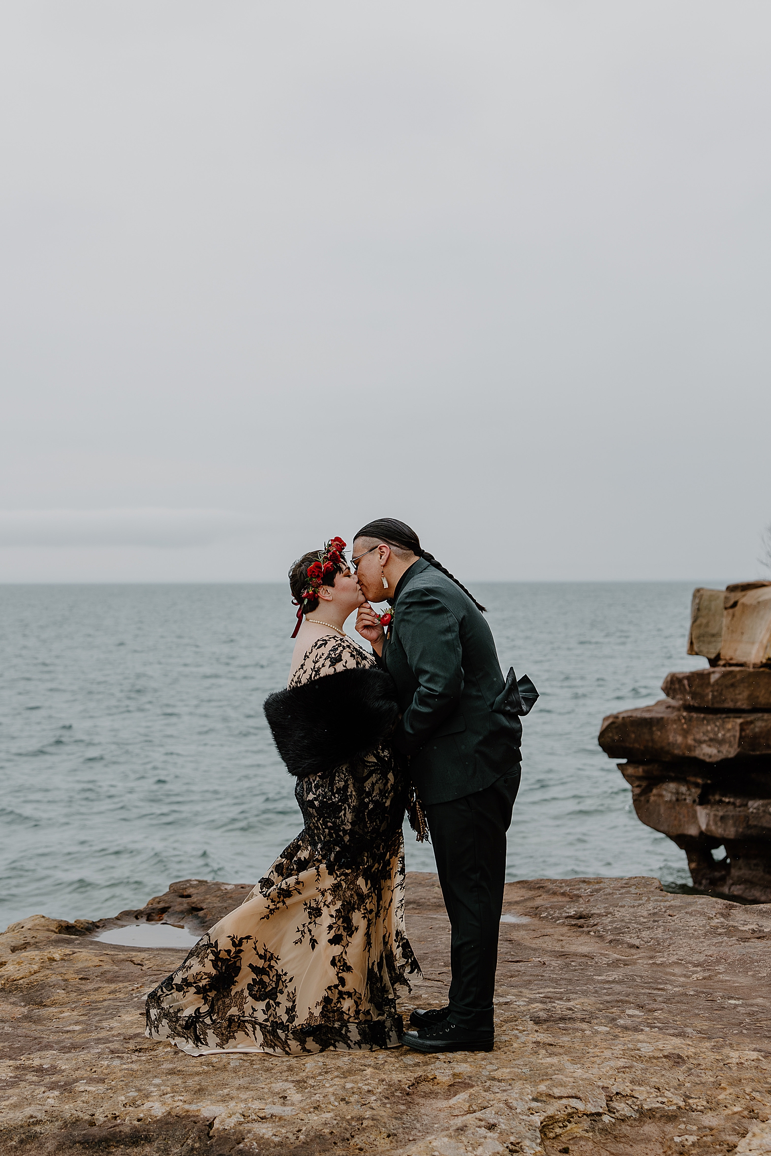 husband and wife share a first kiss after saying i do in private ceremony by Samantha Burke Photography