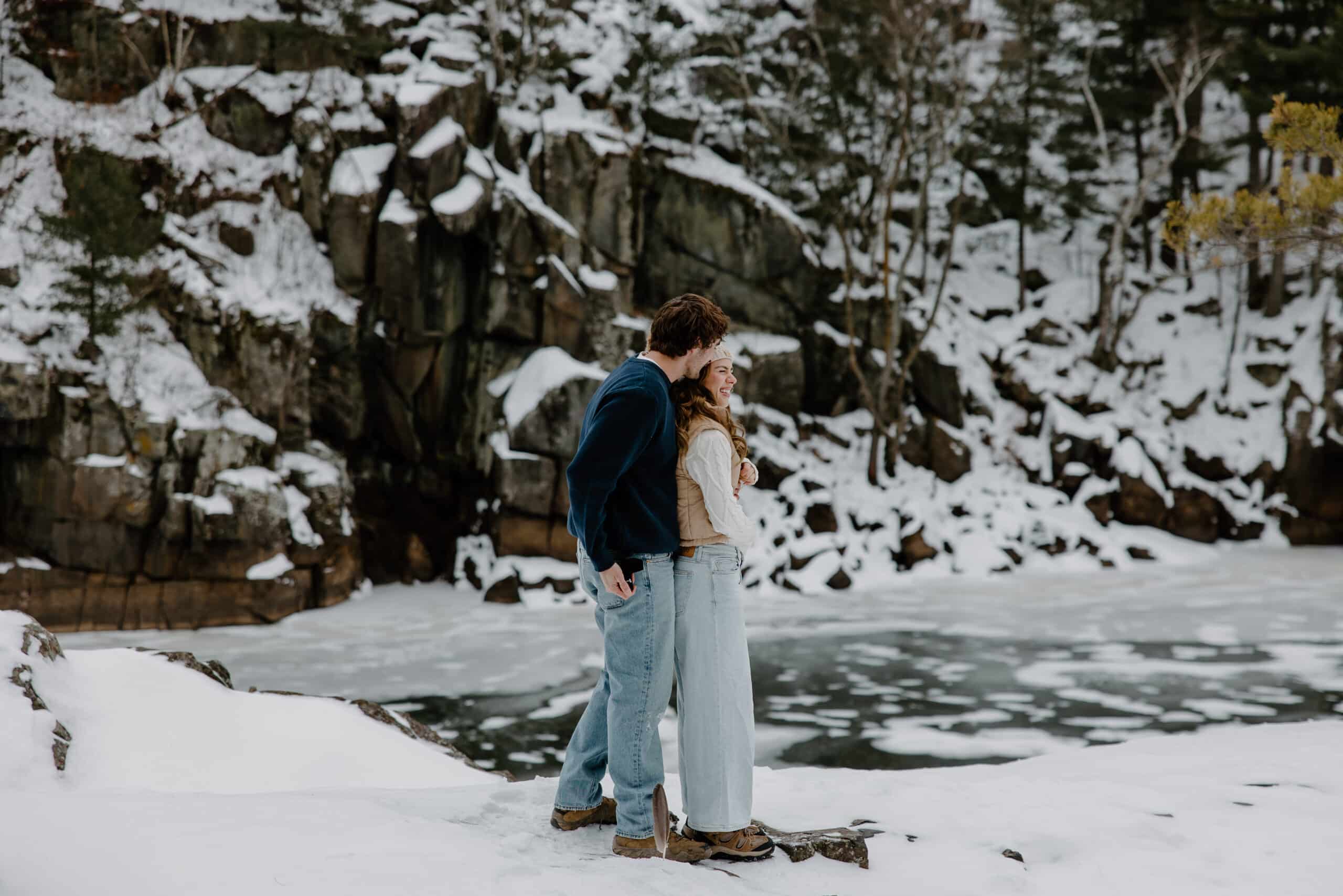man reaches for ring in his back pocket while outside by Samantha Burke Photography