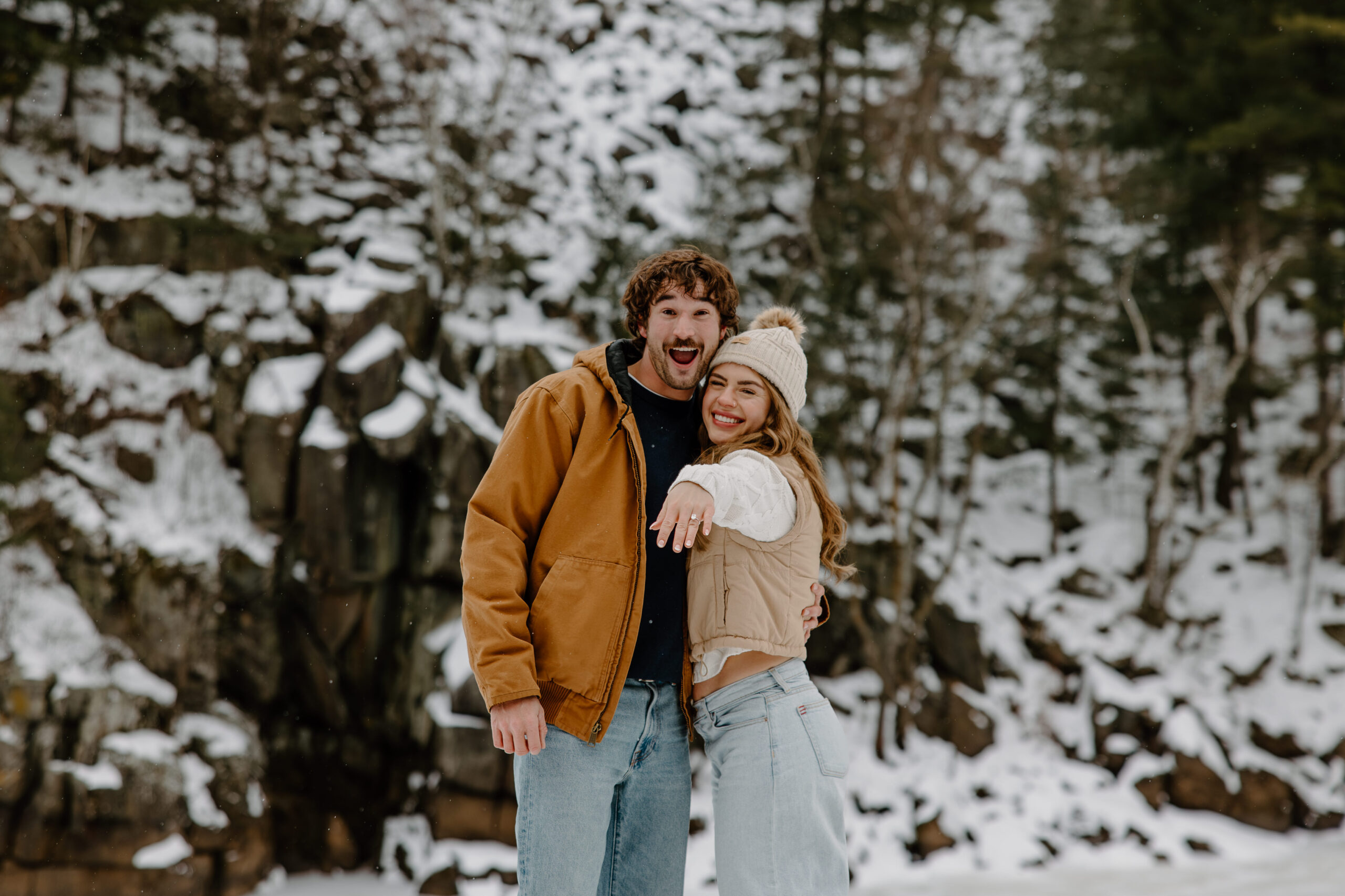 blonde woman shows off her new diamond ring for Interstate State Park Winter Proposal