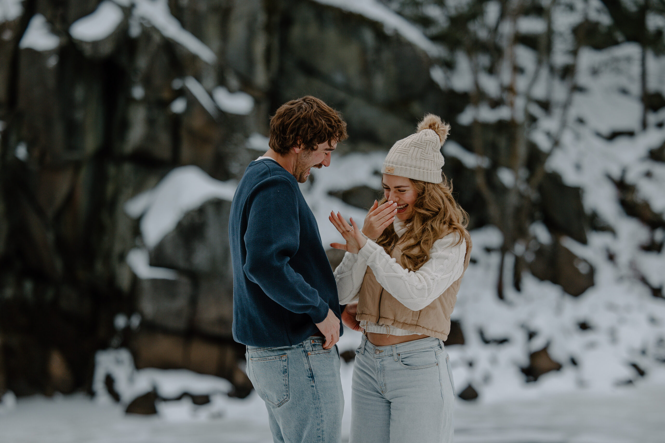 woman cries looking at her new diamond ring on finger by Samantha Burke Photography