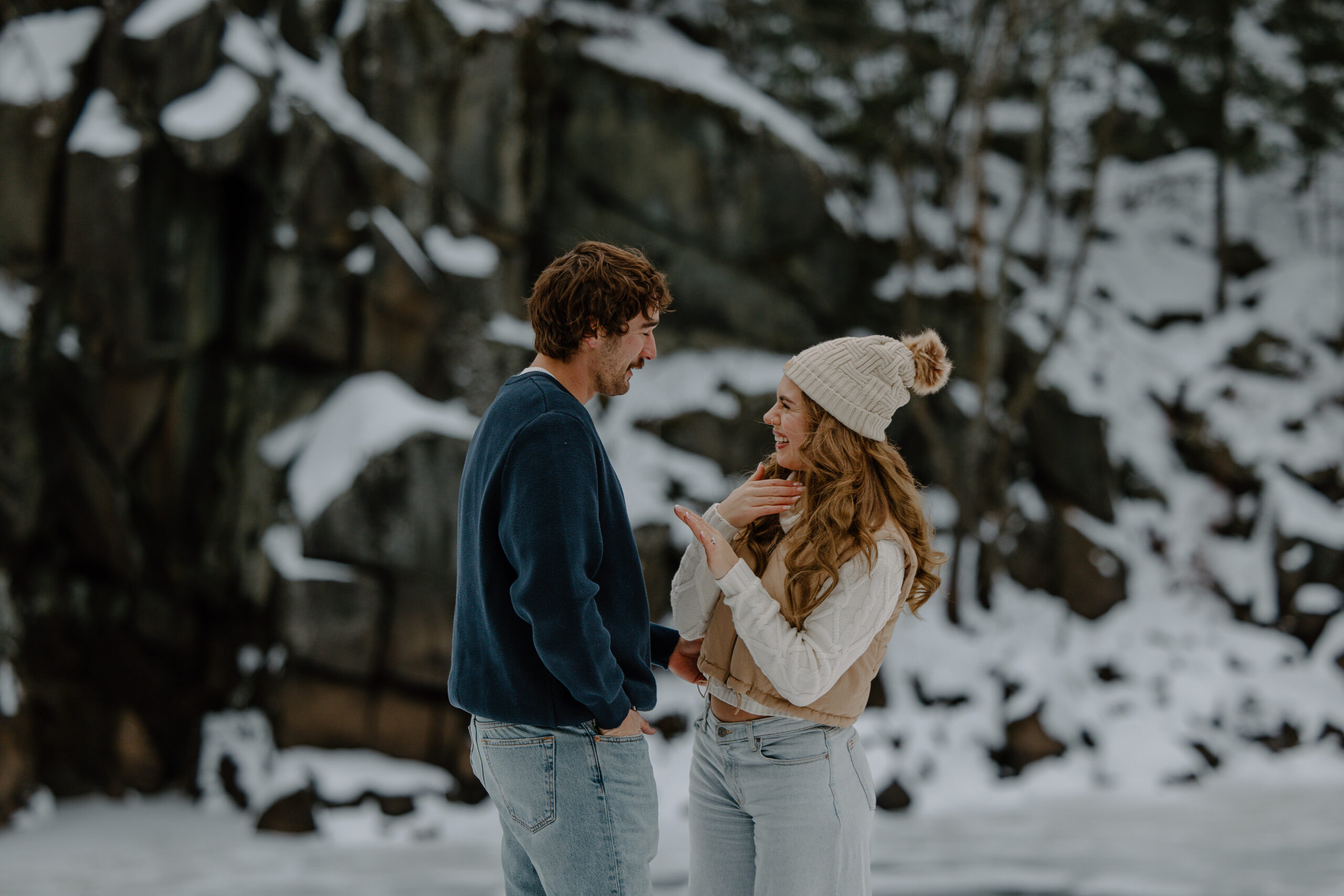 woman laughs in surprise after saying yes to her boyfriend by Wisconsin wedding photographer