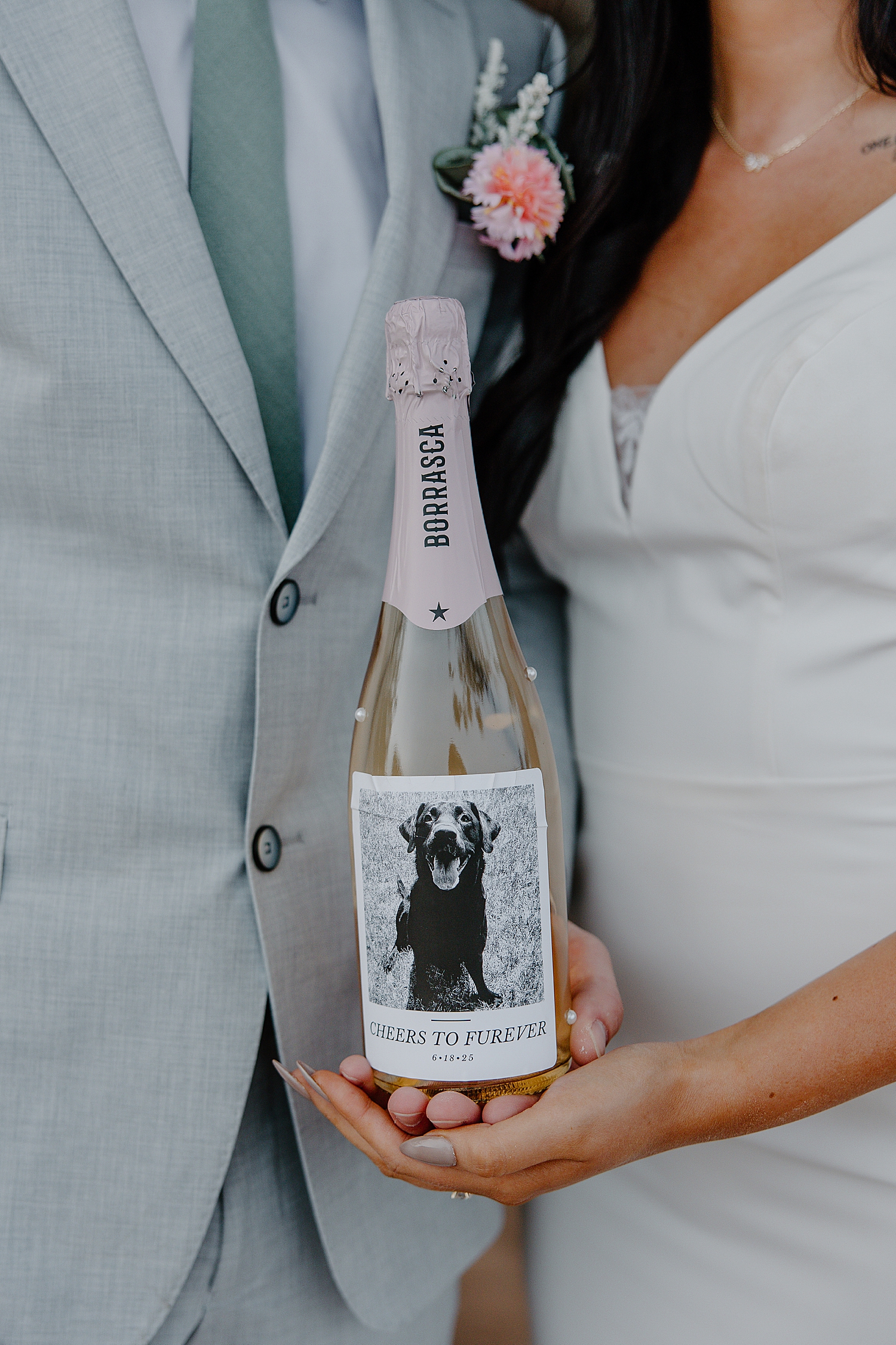 couple show off their wine bottle with dog photo by Samantha Burke Photography